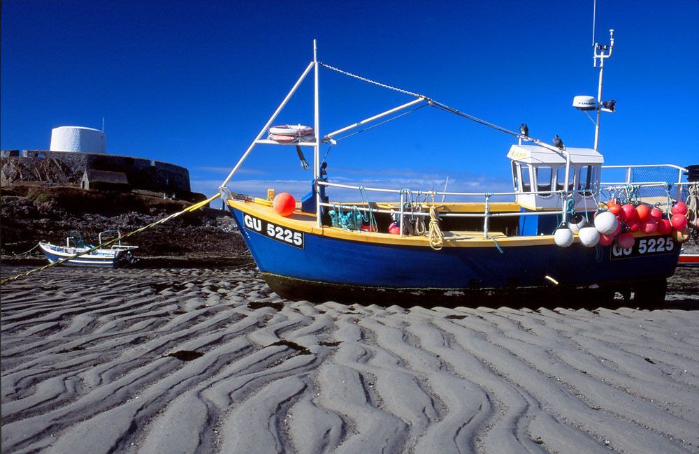 © François Ribard Marée basse autour de Fort Grey, dans Rocquaine Bay, à l'ouest de Guernesey © François Ribard
