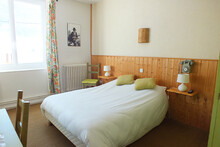 Chambre de l'hotel la Prairie à Méaudre